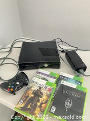 MaxSold Auction: Xbox 360 S (Slim) Black Console with Controller & Games - Waterloo (Ontario, Canada) SELLER MANAGED Downsizing Online Auction - Ennismore Place