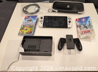 MaxSold Auction: White Nintendo Switch OLED Console with Dock, Case & 2 Zelda Games - Ottawa (Ontario, Canada) SELLER MANAGED Downsizing Online Auction - Melanie Crescent