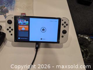 MaxSold Auction: White Nintendo Switch OLED Console with Dock, Case & 2 Zelda Games - Ottawa (Ontario, Canada) SELLER MANAGED Downsizing Online Auction - Melanie Crescent
