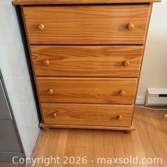 MaxSold Auction: 4 drawer wooden dresser - Ottawa (Ontario, Canada) SELLER MANAGED Charity/Fundraising Online Auction - Pauline-Charron Place