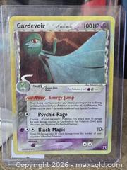 MaxSold Auction: Pokemon Gardevoir Delta Species Holo LP 6/113 - Toronto (Ontario, Canada) PARTNER MANAGED Downsizing Online Auction - McAdam Avenue