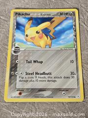 MaxSold Auction: Pokemon Pikachu Holon Phantoms NM 79/110 - Toronto (Ontario, Canada) PARTNER MANAGED Downsizing Online Auction - McAdam Avenue