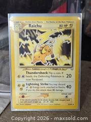 MaxSold Auction: Pokemon Raichu Neo Revelation NM 21/64 - Toronto (Ontario, Canada) PARTNER MANAGED Downsizing Online Auction - McAdam Avenue