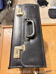 MaxSold Auction: Black Leatherette Briefcase with Built-in Combination Lock - Dysart and Others (Ontario, Canada) SELLER MANAGED Downsizing Online Auction - Webb Circle