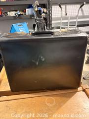 MaxSold Auction: Black Leatherette Briefcase with Built-in Combination Lock - Dysart and Others (Ontario, Canada) SELLER MANAGED Downsizing Online Auction - Webb Circle
