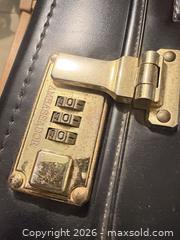 MaxSold Auction: Black Leatherette Briefcase with Built-in Combination Lock - Dysart and Others (Ontario, Canada) SELLER MANAGED Downsizing Online Auction - Webb Circle