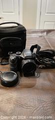 MaxSold Auction: Fujifilm FinePix S2000HD Digital Camera w/ Case & Strap - South Frontenac (Verona)(Ontario, Canada) SELLER MANAGED Downsizing Online Auction - Bank Street