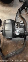 MaxSold Auction: Fujifilm FinePix S2000HD Digital Camera w/ Case & Strap - South Frontenac (Verona)(Ontario, Canada) SELLER MANAGED Downsizing Online Auction - Bank Street