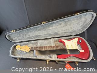 MaxSold Auction: Squier Stratocaster Electric Guitar in Fitted Hard Case - Oakville (Ontario, Canada) PARTNER MANAGED Estate Sale Online Auction - Lakeshore Road West