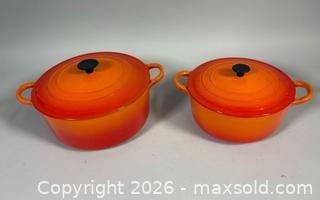 MaxSold Auction: (2) LE CREUSET Enameled Cast Iron Dutch Ovens (E and C) In Flame Orange Color  - Toronto (Ontario, Canada) SELLER MANAGED Reseller Online Auction - Chesswood Drive