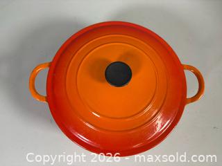 MaxSold Auction: (2) LE CREUSET Enameled Cast Iron Dutch Ovens (E and C) In Flame Orange Color  - Toronto (Ontario, Canada) SELLER MANAGED Reseller Online Auction - Chesswood Drive