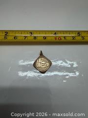 MaxSold Auction: 10K Gold Pisces Fish Pendant Charm - Brantford (Ontario, Canada) PARTNER MANAGED Estate Sale Online Auction - Marshall Street