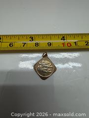 MaxSold Auction: 10K Gold Pisces Fish Pendant Charm - Brantford (Ontario, Canada) PARTNER MANAGED Estate Sale Online Auction - Marshall Street
