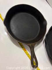 MaxSold Auction: Pair of Vintage Cast Iron Skillets - Brantford (Ontario, Canada) PARTNER MANAGED Estate Sale Online Auction - Marshall Street