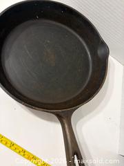 MaxSold Auction: Pair of Vintage Cast Iron Skillets - Brantford (Ontario, Canada) PARTNER MANAGED Estate Sale Online Auction - Marshall Street