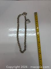 MaxSold Auction: Tiffany & Co. Sterling Silver Charm Bracelet, ~16 inches - Brantford (Ontario, Canada) PARTNER MANAGED Estate Sale Online Auction - Marshall Street