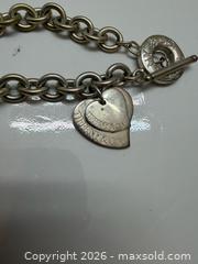 MaxSold Auction: Tiffany & Co. Sterling Silver Charm Bracelet, ~16 inches - Brantford (Ontario, Canada) PARTNER MANAGED Estate Sale Online Auction - Marshall Street