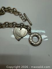MaxSold Auction: Tiffany & Co. Sterling Silver Charm Bracelet, ~16 inches - Brantford (Ontario, Canada) PARTNER MANAGED Estate Sale Online Auction - Marshall Street