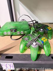 MaxSold Auction: Nintendo 64 Console - Translucent Green (Includes 2 Wired Controllers) - Warwick (Rhode Island, USA) SELLER MANAGED Reseller Online Auction - Warwick Avenue