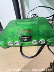 MaxSold Auction: Nintendo 64 Console - Translucent Green (Includes 2 Wired Controllers) - Warwick (Rhode Island, USA) SELLER MANAGED Reseller Online Auction - Warwick Avenue