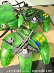 MaxSold Auction: Nintendo 64 Console - Translucent Green (Includes 2 Wired Controllers) - Warwick (Rhode Island, USA) SELLER MANAGED Reseller Online Auction - Warwick Avenue