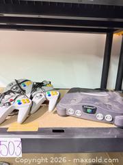 MaxSold Auction: Nintendo 64 (NUS-001) Console Gray and 4 Controllers  - Warwick (Rhode Island, USA) SELLER MANAGED Reseller Online Auction - Warwick Avenue