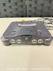 MaxSold Auction: Nintendo 64 (NUS-001) Console Gray and 4 Controllers  - Warwick (Rhode Island, USA) SELLER MANAGED Reseller Online Auction - Warwick Avenue