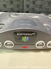 MaxSold Auction: Nintendo 64 (NUS-001) Console Gray and 4 Controllers  - Warwick (Rhode Island, USA) SELLER MANAGED Reseller Online Auction - Warwick Avenue