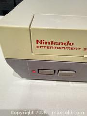 MaxSold Auction: Vintage Nintendo NES-001 1985 (Nintendo Entertainment System) Console - Warwick (Rhode Island, USA) SELLER MANAGED Reseller Online Auction - Warwick Avenue