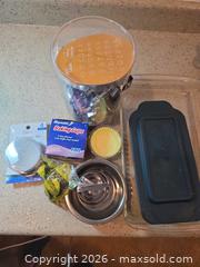 MaxSold Auction: Baking Supplies Lot: Cookie Cutters, Glass Dish, Silicone Lids - Aurora (Colorado, USA) SELLER MANAGED Estate Sale Online Auction - East Lasalle Place