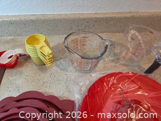 MaxSold Auction: Kitchen silicone lids, measuring cups/spoons & glass cake stand - Aurora (Colorado, USA) SELLER MANAGED Estate Sale Online Auction - East Lasalle Place