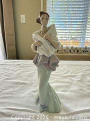MaxSold Auction: Lladró Porcelain Woman Figurine Model 6594 - Aurora (Colorado, USA) SELLER MANAGED Estate Sale Online Auction - East Lasalle Place