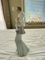 MaxSold Auction: Lladró Porcelain Woman Figurine Model 6594 - Aurora (Colorado, USA) SELLER MANAGED Estate Sale Online Auction - East Lasalle Place