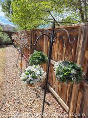 MaxSold Auction: Lot of 4-6 Metal Garden Stakes, Wind Spinners & Hanging Baskets - Aurora (Colorado, USA) SELLER MANAGED Estate Sale Online Auction - East Lasalle Place