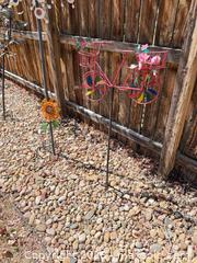 MaxSold Auction: Lot of 4-6 Metal Garden Stakes, Wind Spinners & Hanging Baskets - Aurora (Colorado, USA) SELLER MANAGED Estate Sale Online Auction - East Lasalle Place