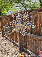 MaxSold Auction: Lot of 4-6 Metal Garden Stakes, Wind Spinners & Hanging Baskets - Aurora (Colorado, USA) SELLER MANAGED Estate Sale Online Auction - East Lasalle Place