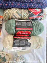 MaxSold Auction: Red Heart Worsted Yarn Lot with Crochet Hook and Granny Squares - Aurora (Colorado, USA) SELLER MANAGED Estate Sale Online Auction - East Lasalle Place