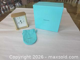 MaxSold Auction: Tiffany & Co. Small Brass Desk/Mantel Clock, Roman Numerals - Aurora (Colorado, USA) SELLER MANAGED Estate Sale Online Auction - East Lasalle Place