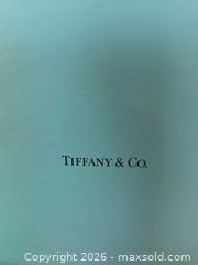 MaxSold Auction: Tiffany & Co. Small Brass Desk/Mantel Clock, Roman Numerals - Aurora (Colorado, USA) SELLER MANAGED Estate Sale Online Auction - East Lasalle Place