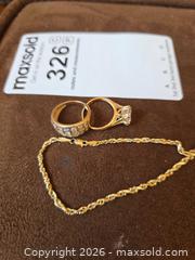 MaxSold Auction: Yellow Solid 14 k Gold Ring and Rope Necklace with crystal stones - Aurora (Colorado, USA) SELLER MANAGED Estate Sale Online Auction - East Lasalle Place