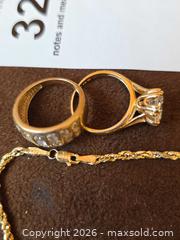 MaxSold Auction: Yellow Solid 14 k Gold Ring and Rope Necklace with crystal stones - Aurora (Colorado, USA) SELLER MANAGED Estate Sale Online Auction - East Lasalle Place