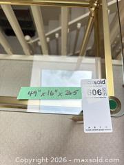 MaxSold Auction: Brass-Plated Glass Top Console Table, 48 x 16 x 25 - Saanich (British Columbia, Canada) PARTNER MANAGED Moving Online Auction - Arbutus Road (CONDO)