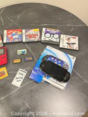 MaxSold Auction: Mixed handheld consoles, game cartridges & PS Vita box BS1 - Richland Township (Pennsylvania, USA) PARTNER MANAGED Moving Online Auction - Winterthur Lane