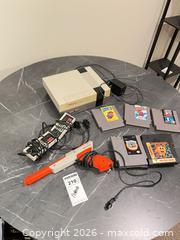 MaxSold Auction: Nintendo NES Console with 2 Controllers, Zapper & Multiple Games BS1 - Richland Township (Pennsylvania, USA) PARTNER MANAGED Moving Online Auction - Winterthur