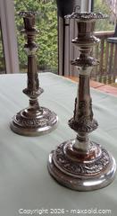 MaxSold Auction: 2 Tall Plate Silver Candle Holders 12 inches - Toronto (Ontario, Canada) SELLER MANAGED Downsizing Online Auction - Blyth Dale Road