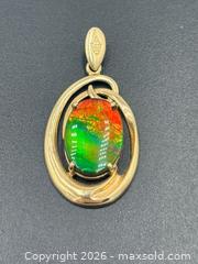MaxSold Auction: 14K Gold Ammolite Gemstone Pendant 2.76G - Maxsold Signature - Discover collectibles, antiques, fine art and more