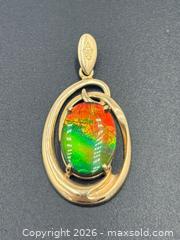 MaxSold Auction: 14K Gold Ammolite Gemstone Pendant 2.76G - Maxsold Signature - Discover collectibles, antiques, fine art and more