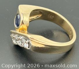 MaxSold Auction: 14K Gold Diamond & Blue Sapphire Bypass Ring With Appraisal 9.37G Size 7.5 - Maxsold Signature - Discover collectibles, antiques, fine art and more