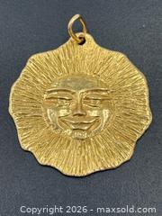 MaxSold Auction: 18K Gold Toni Cavelti Sun Pendant 7.35G - Maxsold Signature - Discover collectibles, antiques, fine art and more