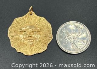 MaxSold Auction: 18K Gold Toni Cavelti Sun Pendant 7.35G - Maxsold Signature - Discover collectibles, antiques, fine art and more